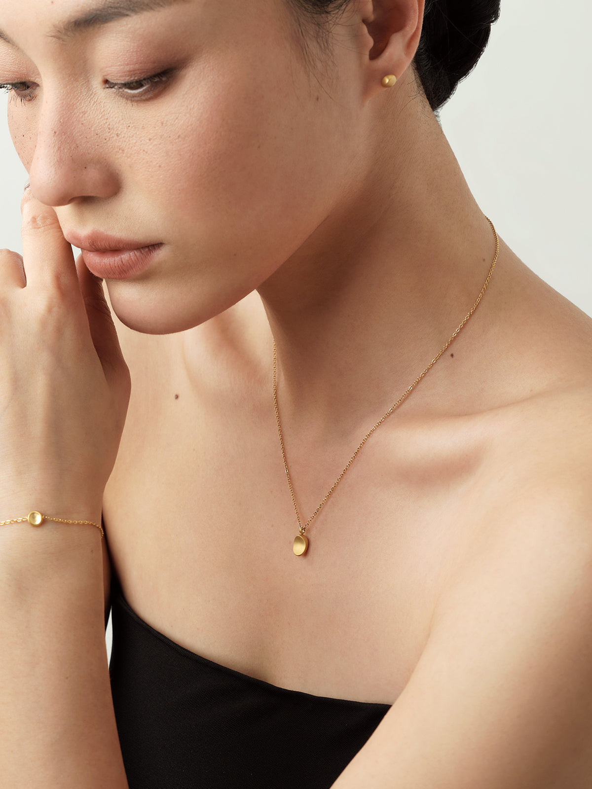 Gilded Matte Oval Necklace